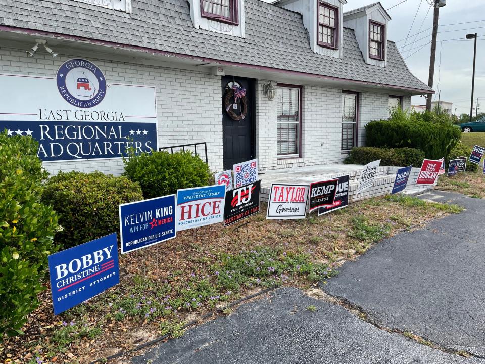 Signs for Republicans line the front of the East Georgia regional headquarters of the Georgia Republican Party in Evans, Ga., on Tuesday, May 24, 2022.