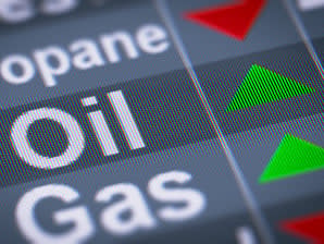 rising oil prices concept. oil next to green up arrow