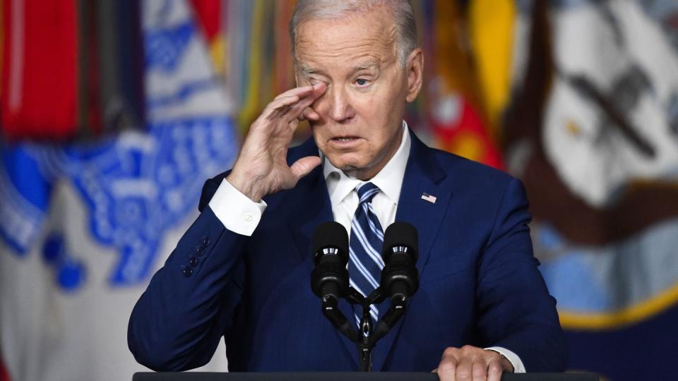 President Joe Biden wipes a tear from his eye while speaking at the George E. Wahlen Department of Veterans Affairs Medical Center, Thursday, Aug. 10, 2023, in Salt Lake City. (Alex Goodlett/AP)