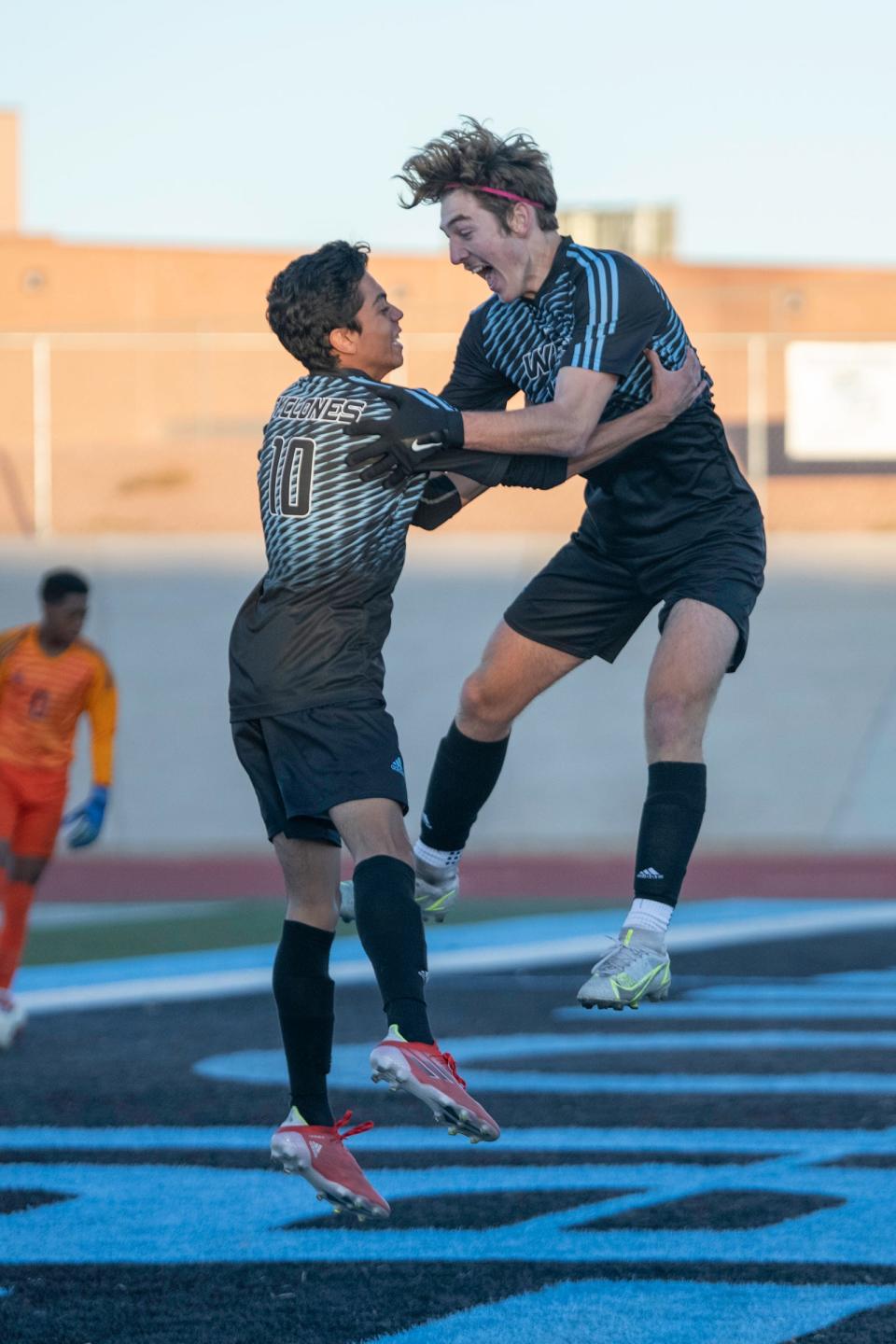 Pueblo West High School's Abram Morales, left, and Bradford Goodrich celebrate after a score during the first round of the Class 4A state boys soccer tournament against Thomas Jefferson on Thursday, October 28, 2021.