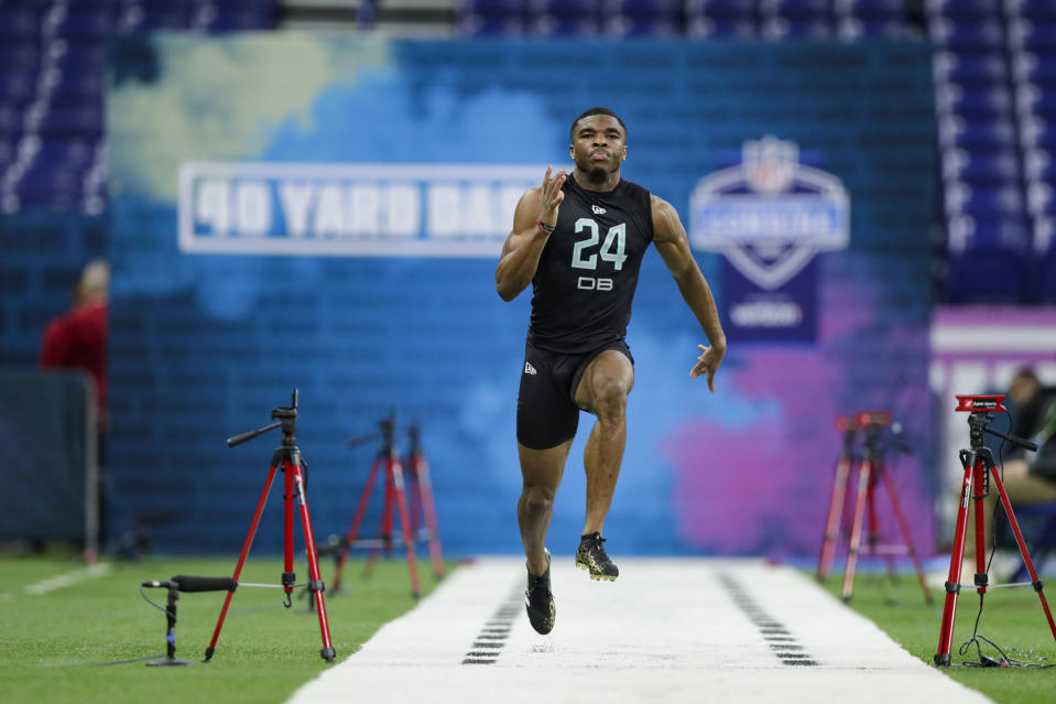 Ohio State defensive back Jeff Okudah runs the 40-yard dash at the NFL football scouting combine in Indianapolis, Sunday, March 1, 2020. (AP Photo/Michael Conroy)