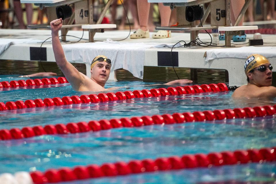 Windsor's Jake Eccleston celebrates after placing first in the 100 yard breaststroke during the Class 4A state swimming championships on Friday, May 10, 2024 at the Veterans Memorial Aquatics Center in Thornton, Colo.