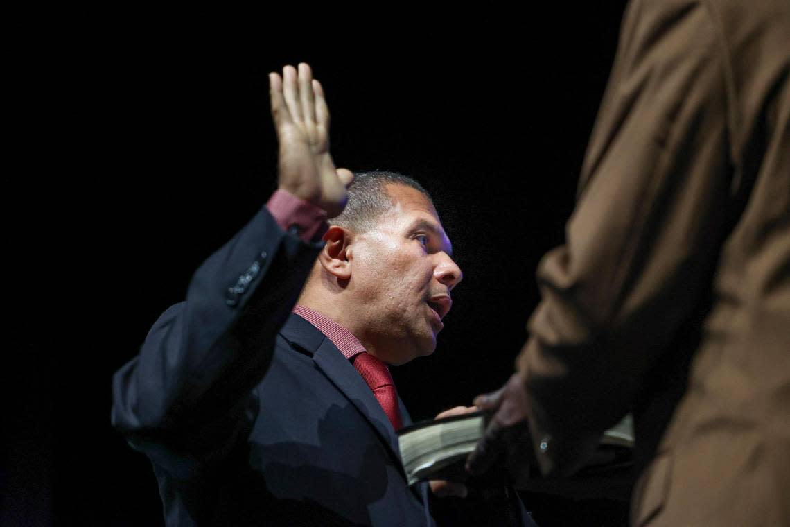 Jeff Holness is sworn into office during a ceremony for newly elected Broward School Board members on Tuesday, Nov. 22, 2022, at Fort Lauderdale High School.