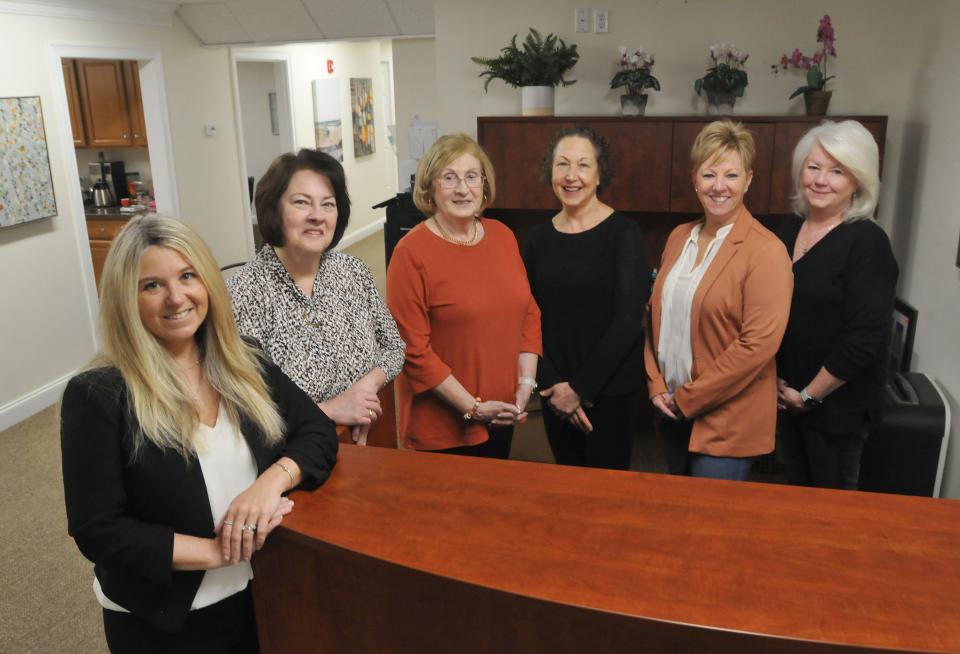 Executive director Susan Johnson, director of client services Lorraine Cabral, intake specialist Libby McCann, director of development Ellen Miller, office manager Kim Borowski and intake specialist Linda Hand, left to right, make up the Cape Cod Times Neighbors Fund staff. The Cape Cod Times Needy Fund is changing its name to the Cape Cod Times Neighbors Fund.