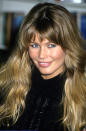 Looking hair commercial ready with her fringe on fleek at a calendar signing at the Waldenbooks Store in New York City.