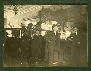 Men are pictured at the Park Garden Cafe. Provided by the Little Traverse Bay Historical Museum