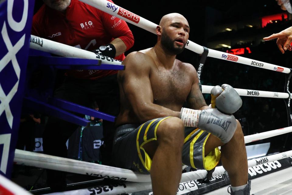 Clarke sank into the ropes then onto the mat after 12 epic rounds (Getty Images)