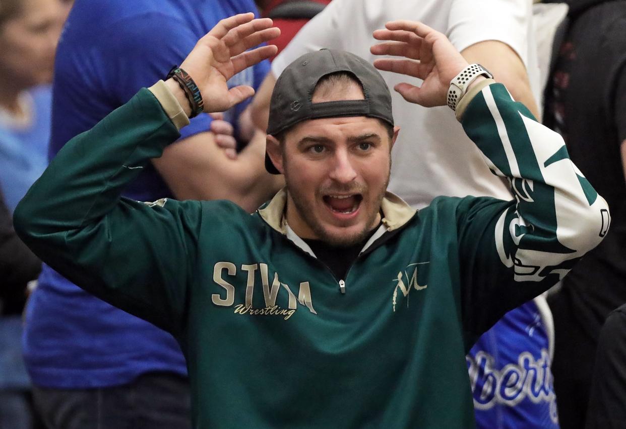 STVM wrestling coach Nic Skonieczny reacts during a match in the Ironman at Walsh Jesuit, Friday, Dec. 8, 2023.