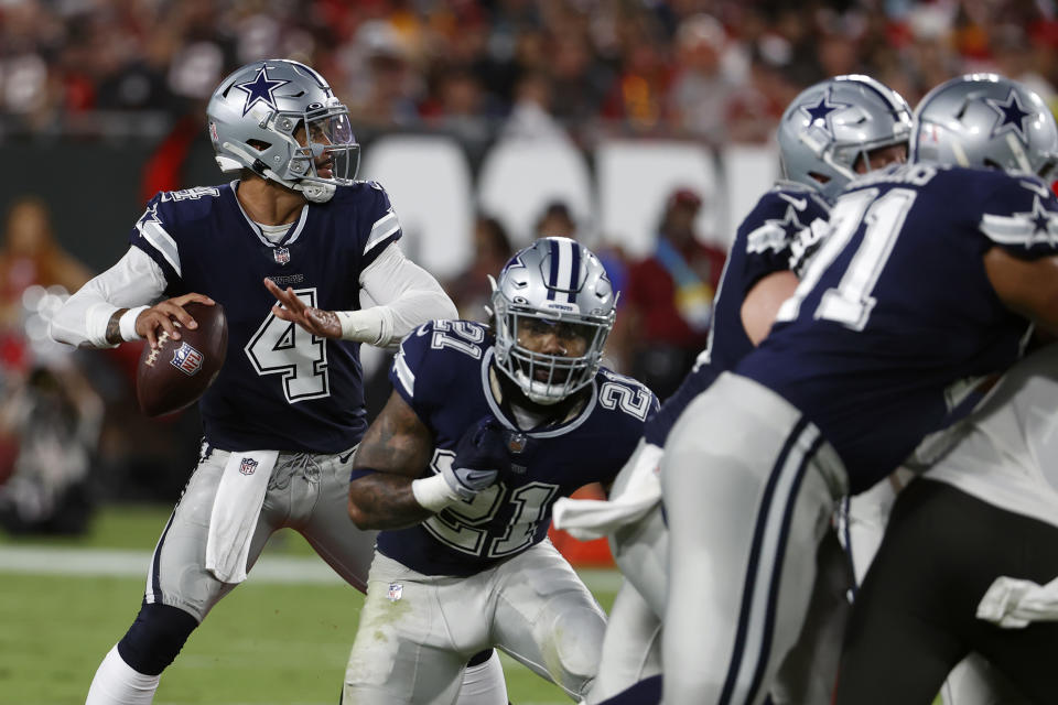 Dallas Cowboys quarterback Dak Prescott (4) looks to pass against the Tampa Bay Buccaneers during the first half of an NFL football game Thursday, Sept. 9, 2021, in Tampa, Fla. (AP Photo/Scott Audette)