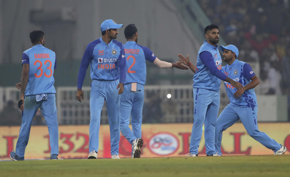 India's Arshdeep Singh, center back to camera, celebrates with teammates the dismissal of New Zealand's Ish Sodhi during the second T20 international cricket match between India and New Zealand in Lucknow, India, Sunday, Jan. 29, 2023. (AP Photo/Surjeet Yadav)