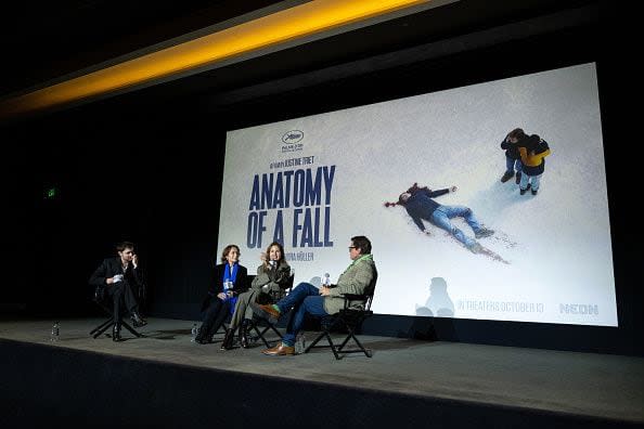 WEST HOLLYWOOD, CALIFORNIA - NOVEMBER 16: (L-R) Writer Arthur Harari, interpreter Katherine Vallin, writer / director Justine Triet and Film Independent President Josh Welsh attend the Film Independent Special Screening of 