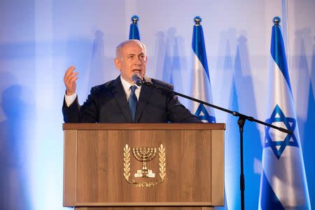 Israeli Prime Minister Benjamin Netanyahu speaks at an event marking the 50th anniversary of Israel's capture of East Jerusalem during the 1967 Six-Day War, opposite the Old City wall and near the Tower of David in Jerusalem May 21, 2017. REUTERS/Abir Sultan/Pool