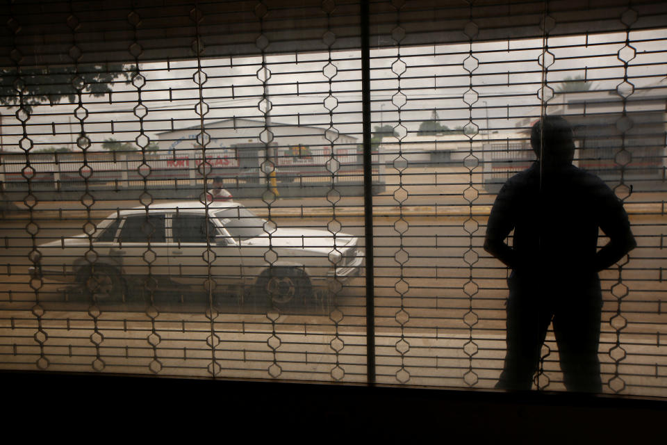 A taxi driver waits for customers in El Tigre, Venezuela, on June 4. (Photo: Ivan Alvarado/Reuters)