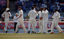 Cricket - India v Australia - Third Test cricket match - Jharkhand State Cricket Association Stadium, Ranchi, India - 20/03/17 - Australia's Matt Renshaw (2nd L) walks off the field as Indian players celebrate his dismissal. REUTERS/Adnan Abidi