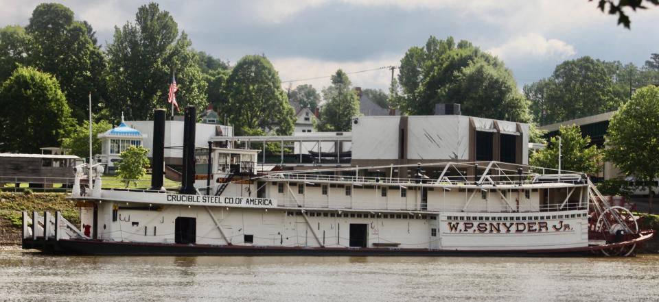 The historic sternwheel towboat W.P.Snyder is docked in front of the Ohio River Museum on the Muskingum River.