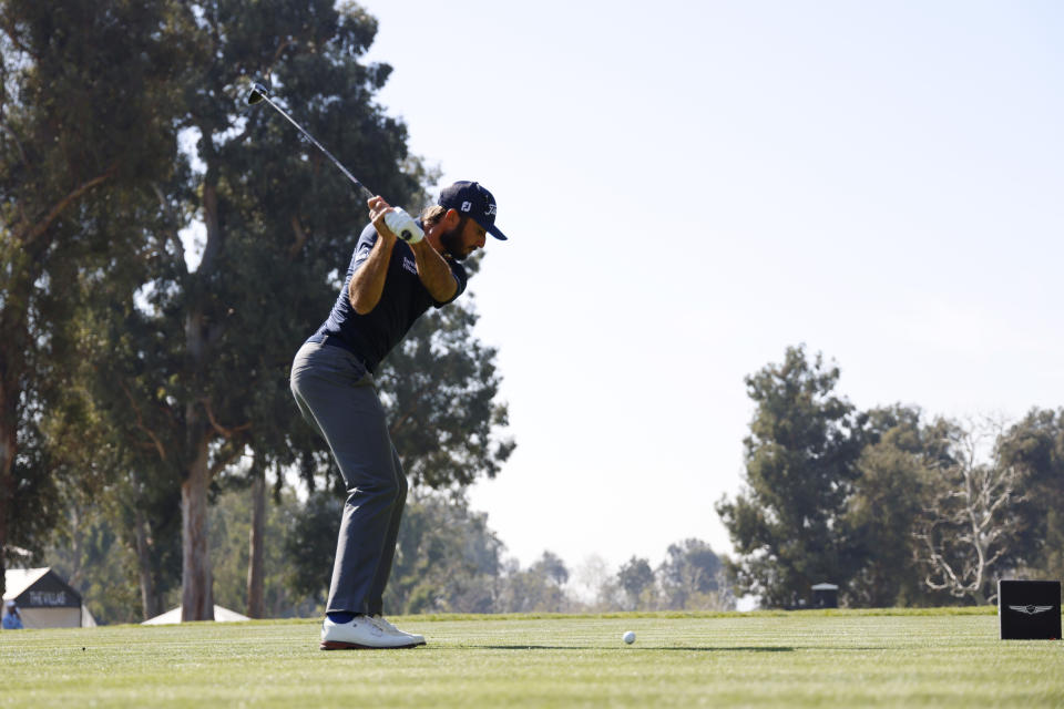 Max Homa hits from the fourth tee during the final round of the Genesis Invitational golf tournament at Riviera Country Club, Sunday, Feb. 19, 2023, in the Pacific Palisades area of Los Angeles. (AP Photo/Ryan Kang)