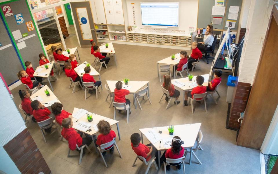 A socially-distanced classroom at Charles Dickens Primary School in London  - PA
