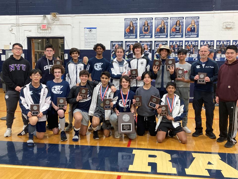 The Chatham boys fencing team celebrates its fourth straight Morris County Tournament title on Jan. 14, 2023.