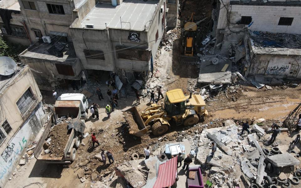 Clean-up operations at the Nur Shams refugee camp in the West Bank, one of the areas in which UNRWA provides services