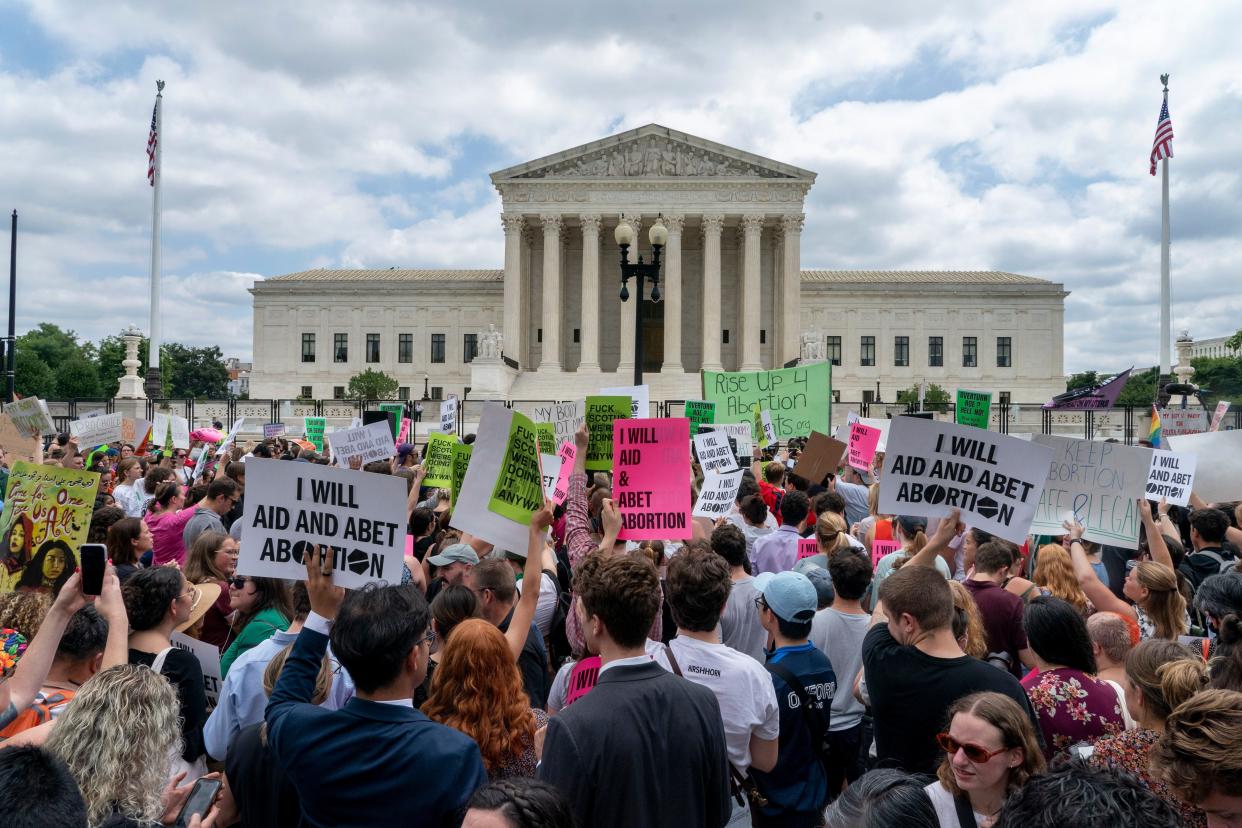 Abortion-rights protesters regroup and protest following Supreme Court's decision to overturn Roe v. Wade, federally protected right to abortion, in Washington on Friday.