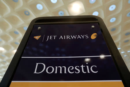 A Jet Airways signage is seen at a check-in counter at the Chhatrapati Shivaji International airport in Mumbai, February 14, 2018. REUTERS/Danish Siddiqui/Files