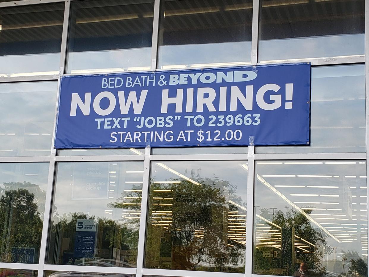 A sign last summer at Bed Bath & Beyond on the Northwest Side illustrates the challenge employers are having finding workers.