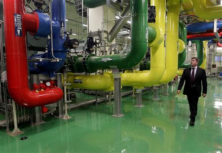 Google's vice president of data centres Joe Kava walks past a cooling system facility during a media tour at the Google data centre in Changhua Coastal Industrial Park, central Taiwan, December 11, 2013. Google Inc. said on Wednesday it will double its planned investment to $600 million for its data centre in Taiwan to cater to the world's fastest growing technology consumer markets. REUTERS/Pichi Chuang