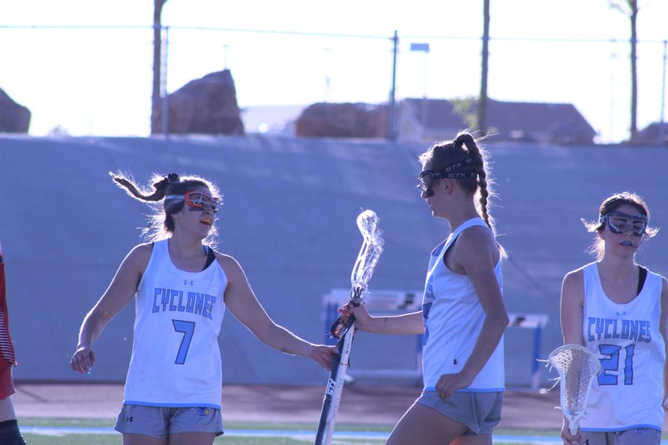 Morgan Avila (#7) and Talya Wilson (#16) celebrate after a goal against Durango in the CHSAA Class 4A first-round playoff game on May 10, 2022.