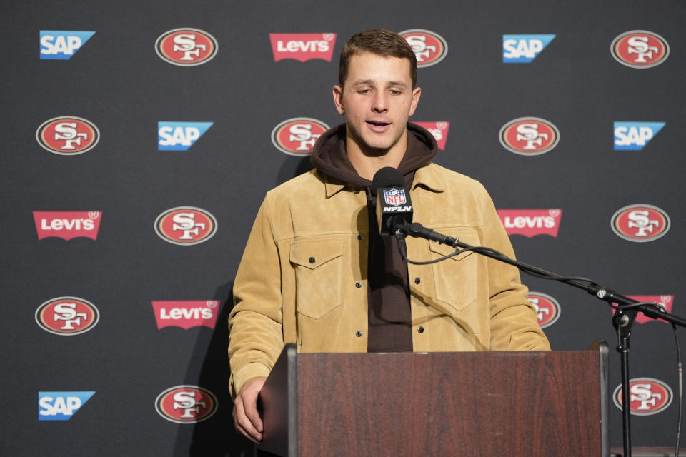 San Francisco 49ers quarterback Brock Purdy addresses the media after an NFL football game, Thursday, Nov. 23, 2023, in Seattle. (AP Photo/Stephen Brashear)