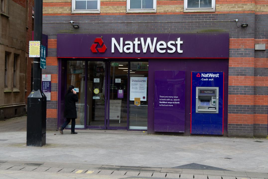 Slough, Berkshire, UK. 19th April, 2024. The NatWest Bank branch in Slough High Street in Berkshire is to close on 12th September, 2024. NatWest has recently announced the closure of a number of their banks across the UK. Footfall in many banks is down as more people are using online banking. Credit: Maureen McLean/Alamy Live News