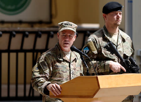 Incoming Commander of Resolute Support forces and command of NATO forces in Afghanistan, U.S. Army General Scott Miller speaks during a change of command ceremony in Resolute Support headquarters in Kabul, Afghanistan September 2, 2018.REUTERS/Mohammad Ismail