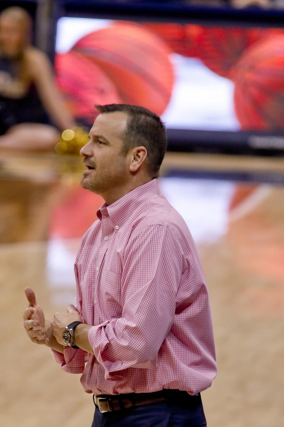 Louisville head coach Jeff Walz talks to his players as they play against Pittsburgh during the second half of an NCAA college basketball game, Sunday, March 3, 2019, in Pittsburgh. (AP Photo/Keith Srakocic)