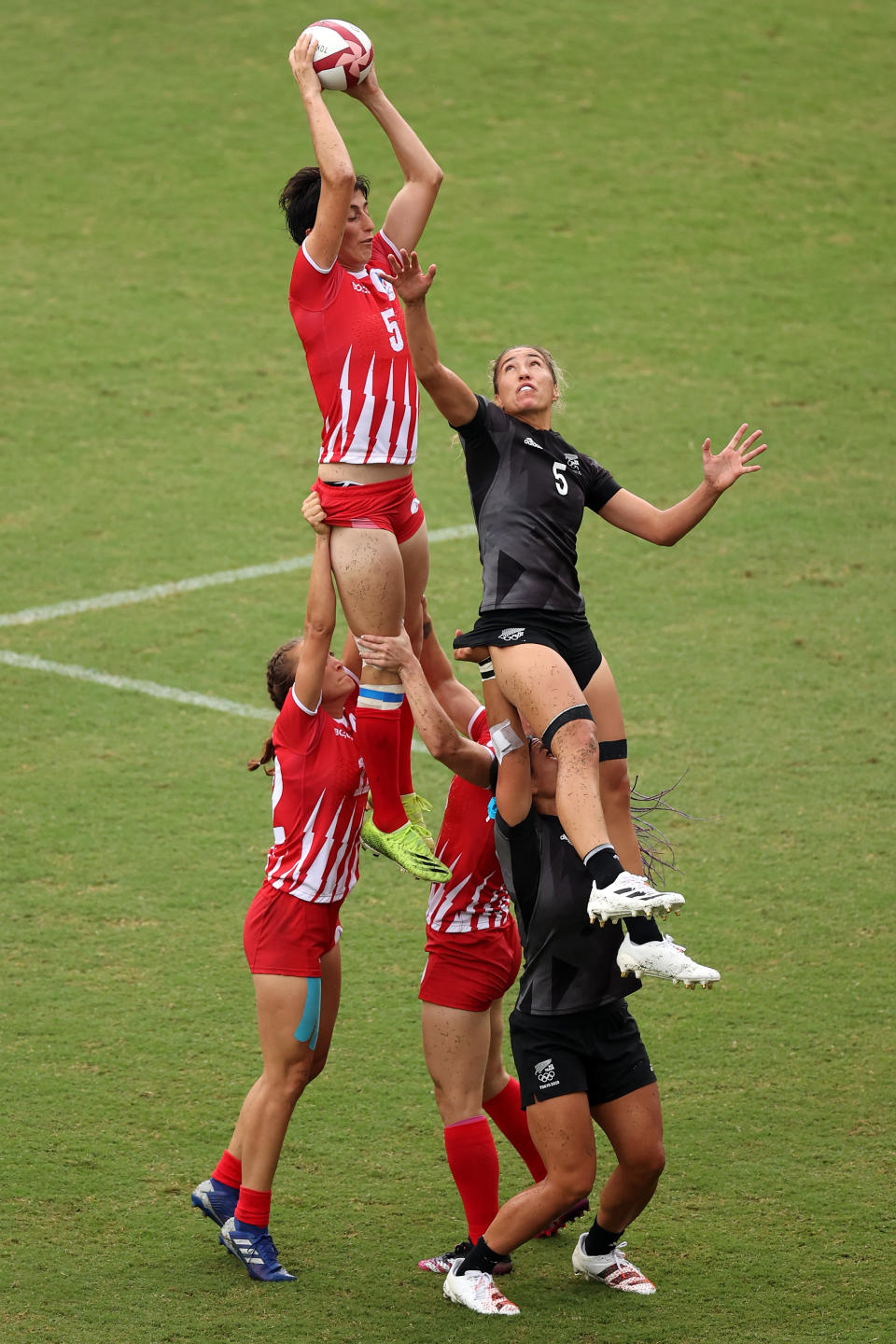 <p>CHOFU, JAPAN - JULY 30: Baizat Khamidova of Team ROC and Sarah Hirini of Team New Zealand jump at the lineout in the Womenâs pool A match between Team New Zealand and Team ROC during the Rugby Sevens on day seven of the Tokyo 2020 Olympic Games at Tokyo Stadium on July 30, 2021 in Chofu, Tokyo, Japan. (Photo by Dan Mullan/Getty Images)</p> 