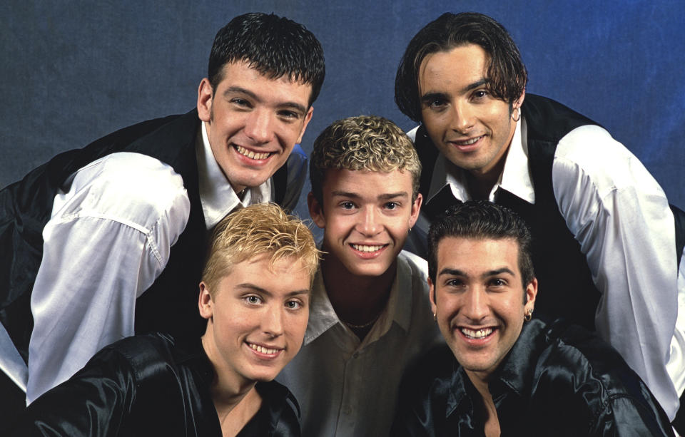 Lance Bass posed in 1997 with fellow NSYNC members JC Chasez, Joey Fatone, Chris Kirkpatrick and Justin Timberlake. Bass came out as gay in 2006. (S'nke Flor/ / SULUPRESS.DE)