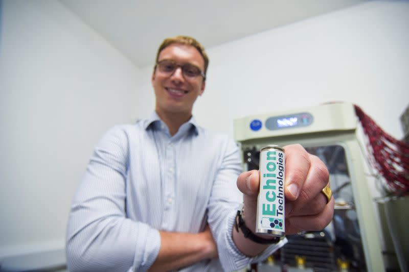 Echion Technologies CEO Jean de La Verpilliere holds up a commercial format prototype battery at the battery startup’s headquarters in Cambridge