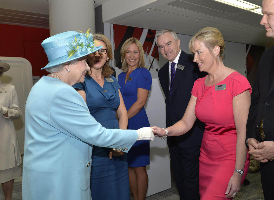 LONDON, UNITED KINGDOM - JUNE 07: Queen Elizabeth II meets weather presenter Carol Kirkwood as she opens the new BBC Broadcasting House on June 7, 2013 in London, England. (Photo by Arthur Edwards - WPA Pool/Getty Images)