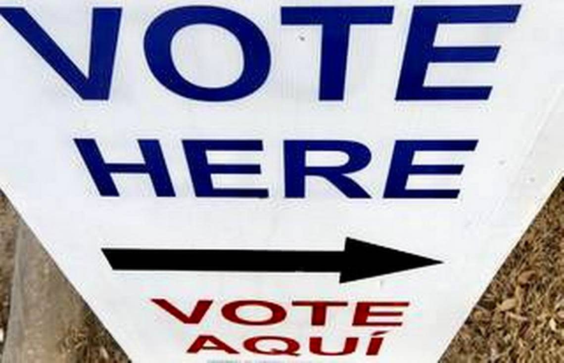 A sign offers directions to a voting location in the Lake Como neighborhood of Fort Worth.