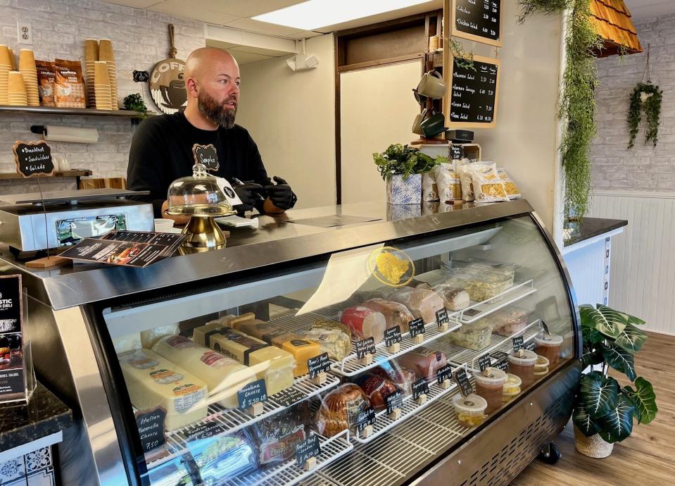 Dennis Friedmann greets customers at The Rustic, his new sandwich shop in Cape Coral.