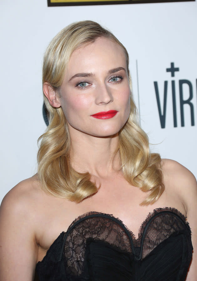 Diane Kruger teamed her red lips with wavy blonde locks at the Critics Choice TV Awards. [Rex]