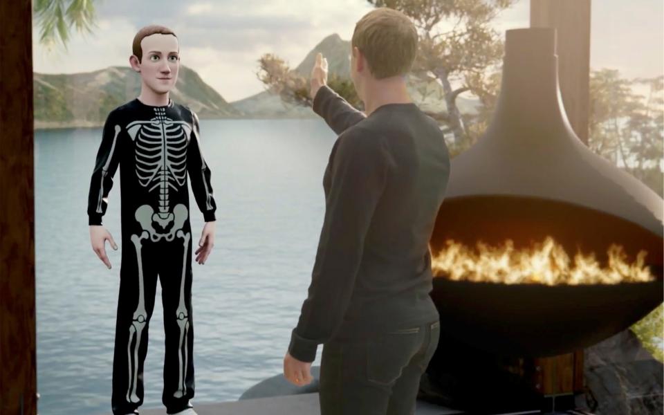 Facebook CEO Mark Zuckerberg speaks to an avatar of himself in the "Metaverse" during a live-streamed virtual and augmented reality conference to announce the rebrand of Facebook as Meta, in this screen grab taken from a video released October 28, 2021. Facebook/Handout via REUTERS ATTENTION EDITORS - THIS IMAGE HAS BEEN SUPPLIED BY A THIRD PARTY. NO RESALES. NO ARCHIVES. MANDATORY CREDIT - FACEBOOK/REUTERS