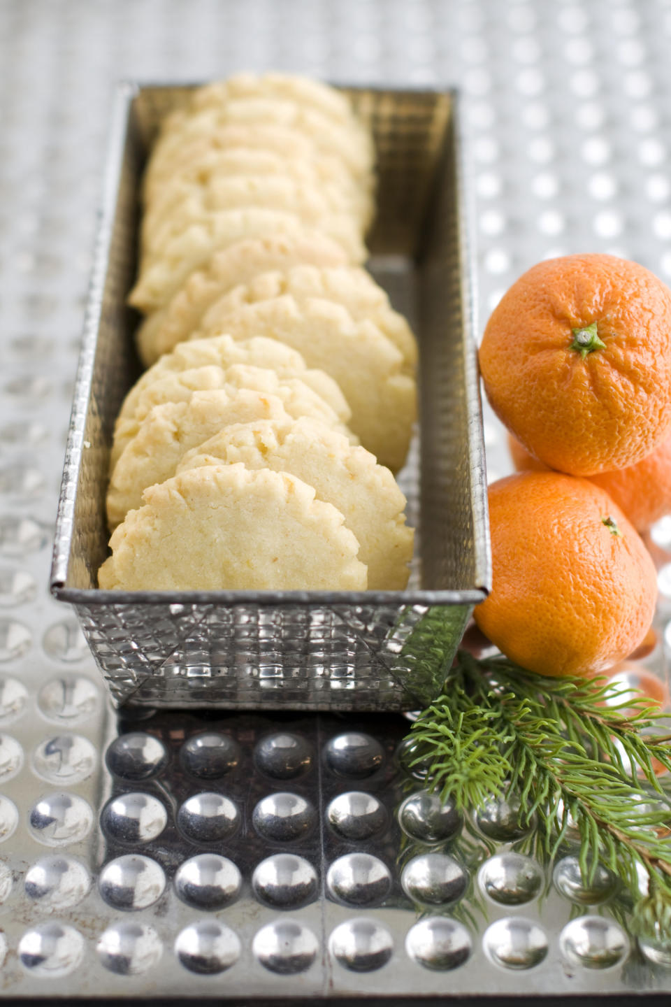 In this image taken on Monday, Nov. 5, 2012, tangerine mace shortbread cookies are shown in Concord, N.H. (AP Photo/Matthew Mead)