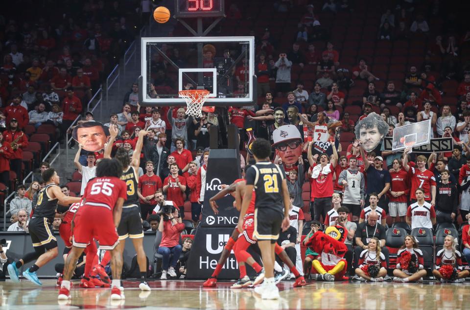 Louisville students tried to distract UMBC Retrievers guard Dion Brown (13) while he was at the free throw line in the second half. The crowd was noticeably louder in the Cards opener than the two exhibition games. Nov.6, 2023.