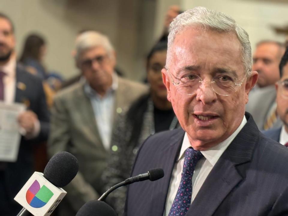 Former Colombian President Álvaro Uribe Vélez speaks to reporters in Tallahassee on Jan. 10, 2024.