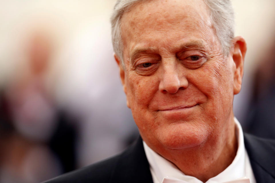 Businessman David Koch arrives at the Metropolitan Museum of Art Costume Institute Gala Benefit in New York on May 5, 2014. | Carlo Allegri—Reuters