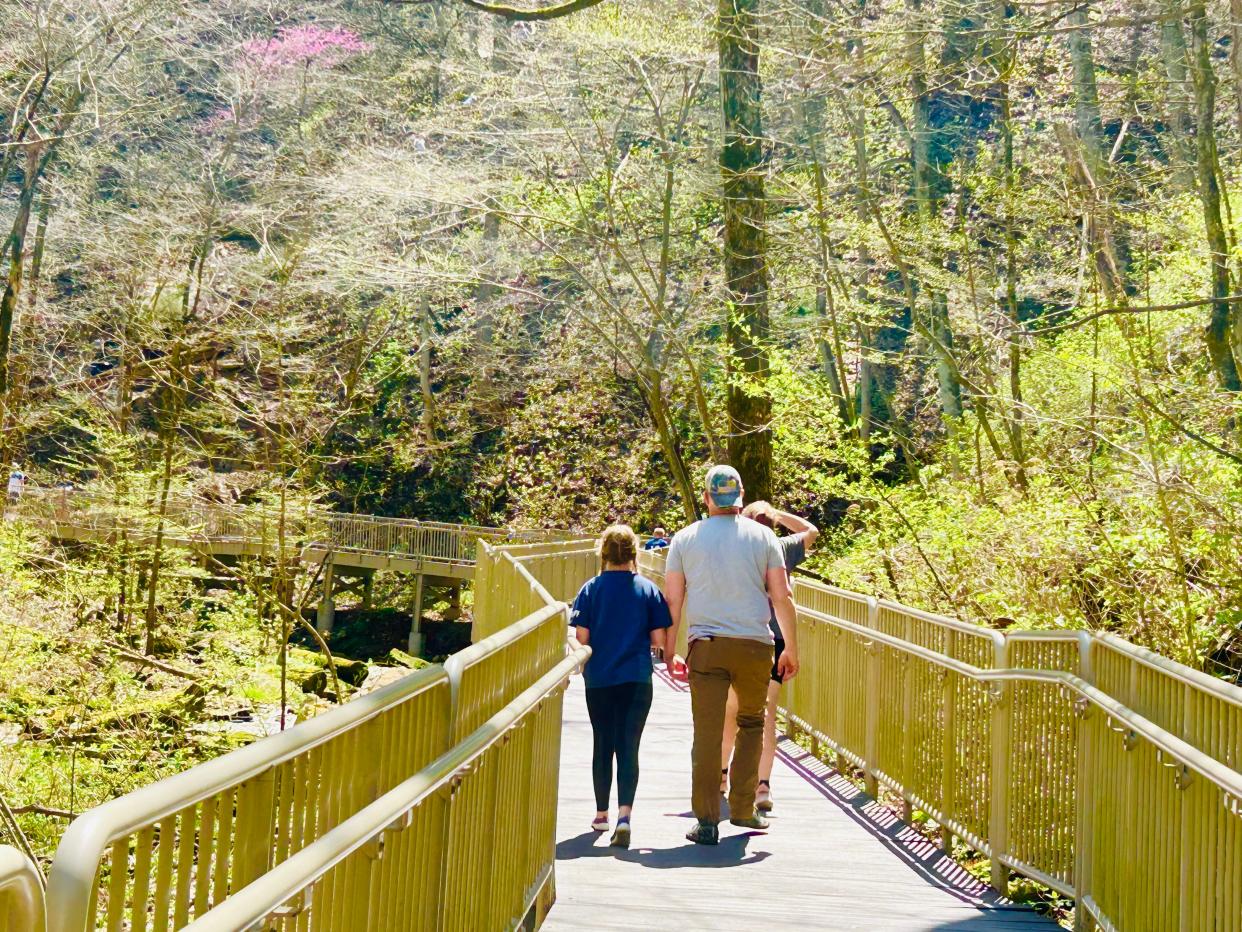 A ramp leads up to the entrance of Donaldson Cave at Spring Mill State Park.