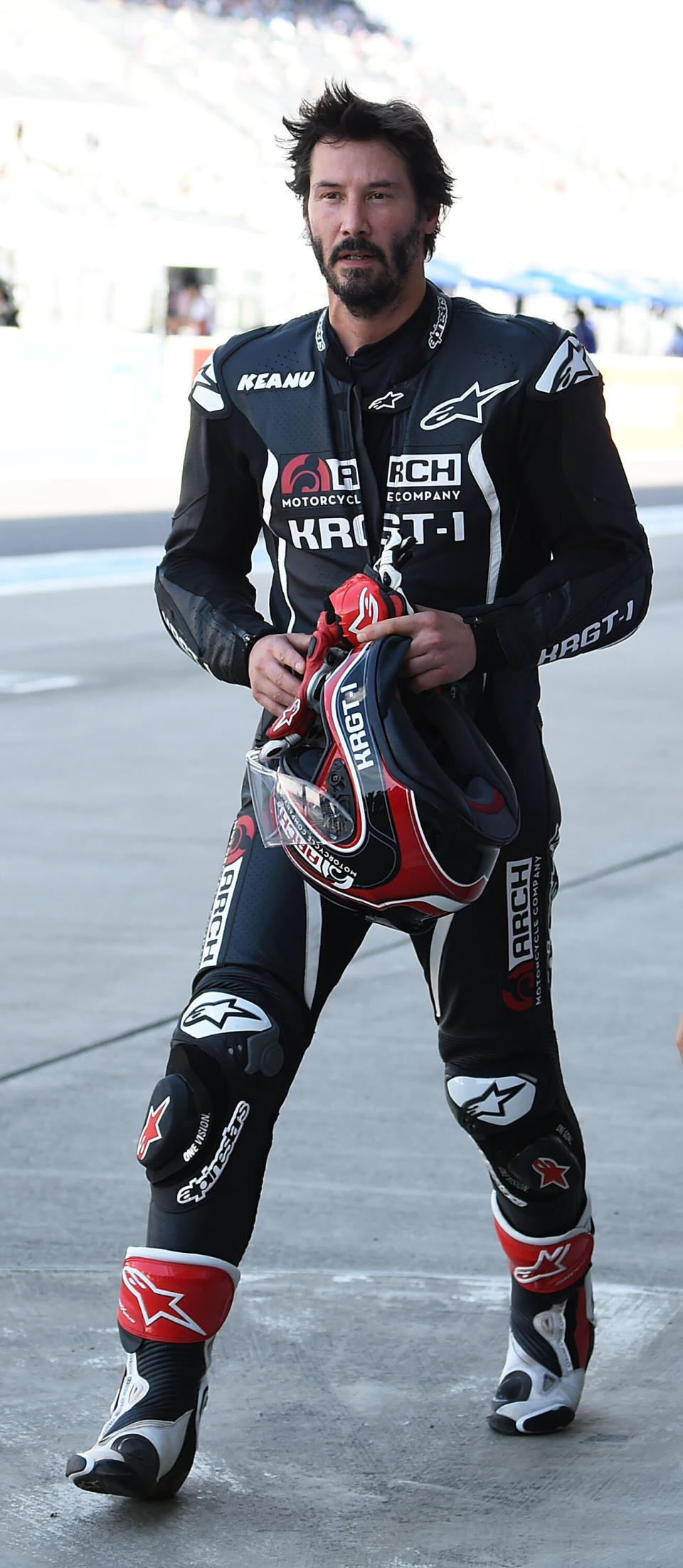 Reeves test-rides his Arch Motorcycle during the Suzuka 8 Hours at the Suzuka Circuit in Suzuka, Japan.