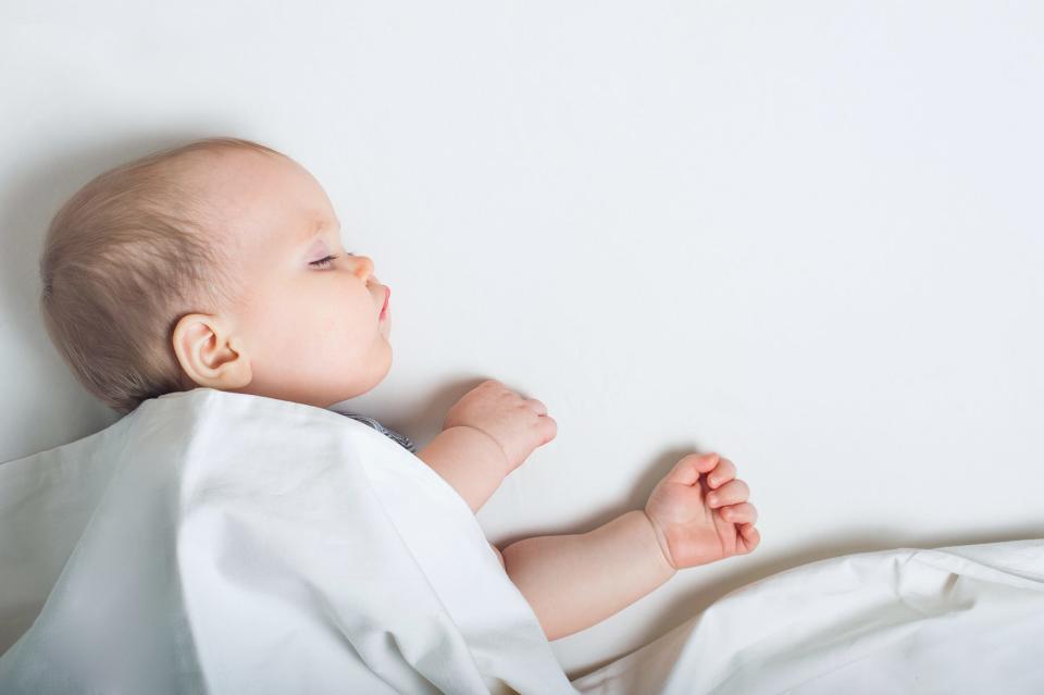 A baby is pictured sleeping