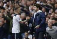 Britain Football Soccer - Tottenham Hotspur v Arsenal - Premier League - White Hart Lane - 30/4/17 Tottenham's Kieran Trippier is congratulated by manager Mauricio Pochettino as he is substituted Action Images via Reuters / Paul Childs Livepic