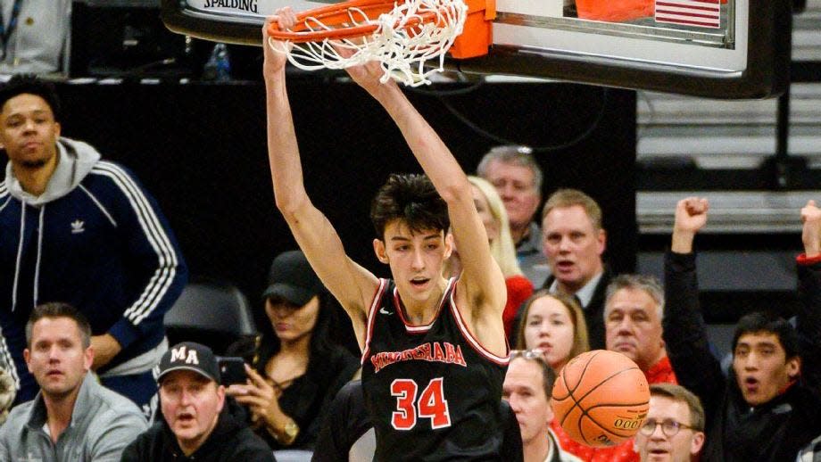 Chet Holmgren, the nation's No. 1 recruit, is shown here dunking.