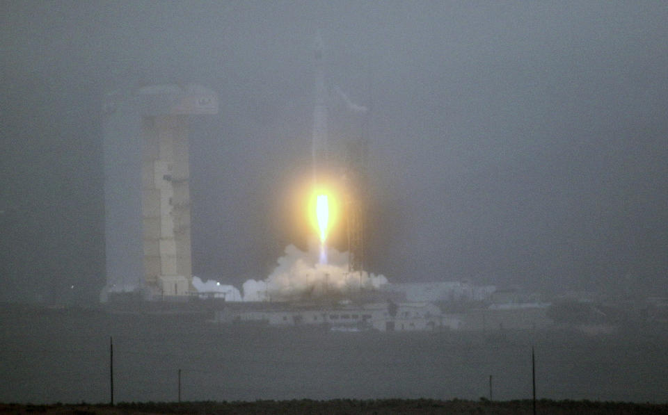 A United Launch Alliance Atlas V rocket lifts off carrying the Landsat 9 earth imaging satellite from Vandenberg Space Force Base, Calif., on Monday, Sept. 27, 2021. It is the latest in a series of U.S. satellites that has recorded human and natural impacts on Earth's surface for decades. (Matt Hartman via AP)